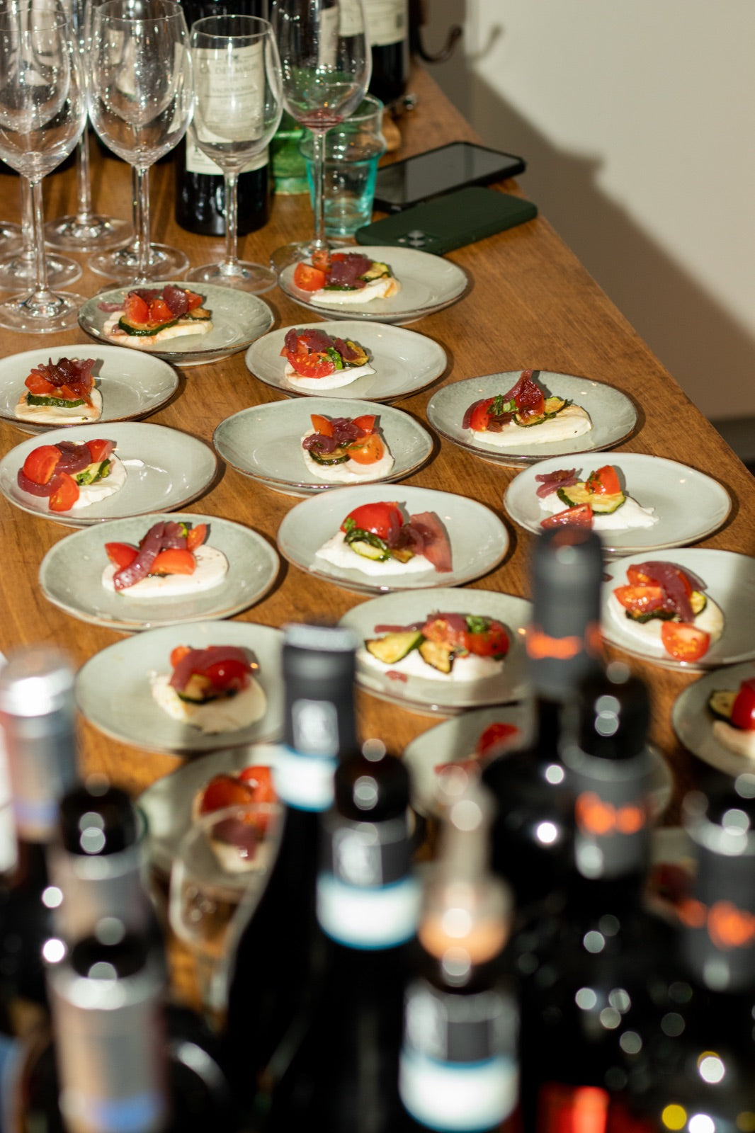 Plated food and wine pairing courses at a private tasting