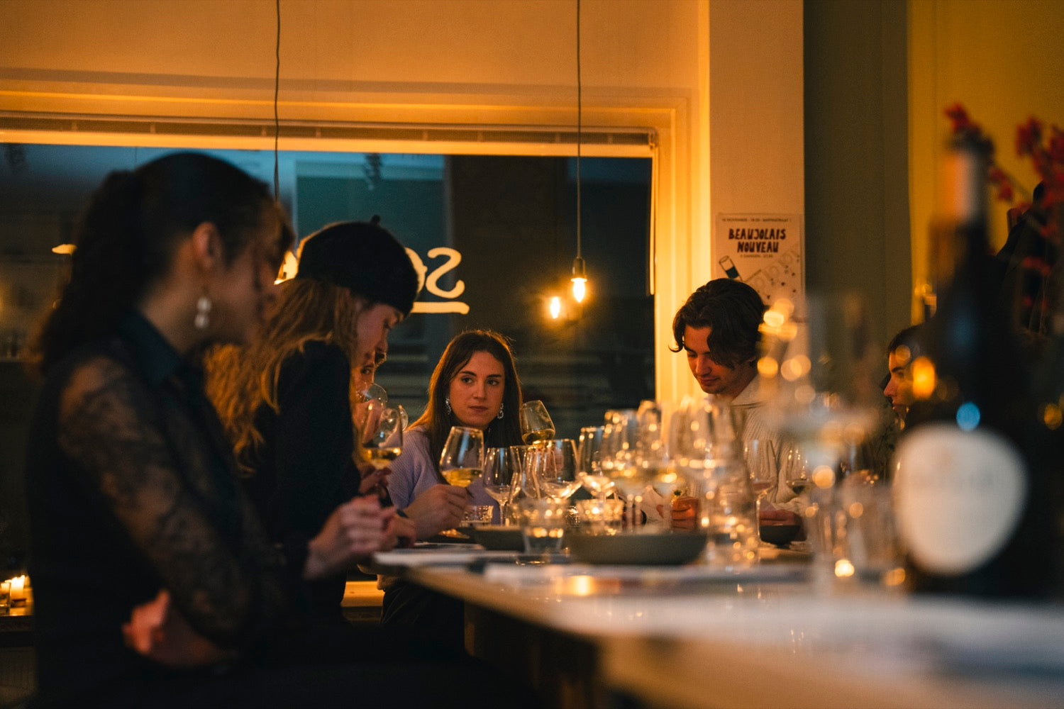 A private wine tasting around a candlelit table in Amsterdam